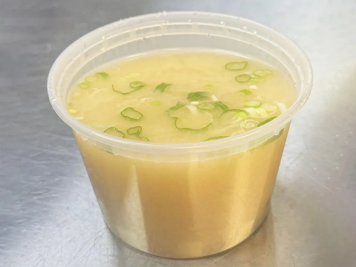 Warm miso soup with green onions at Lin Poke, a Hawaiian Poke Bowl Restaurant in Clearwater